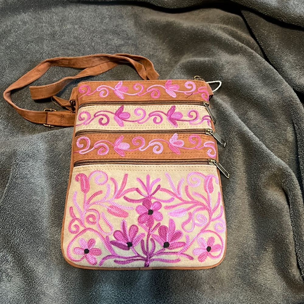 Boho Tan and Brown suede crossbody purse with magenta stitching that pops